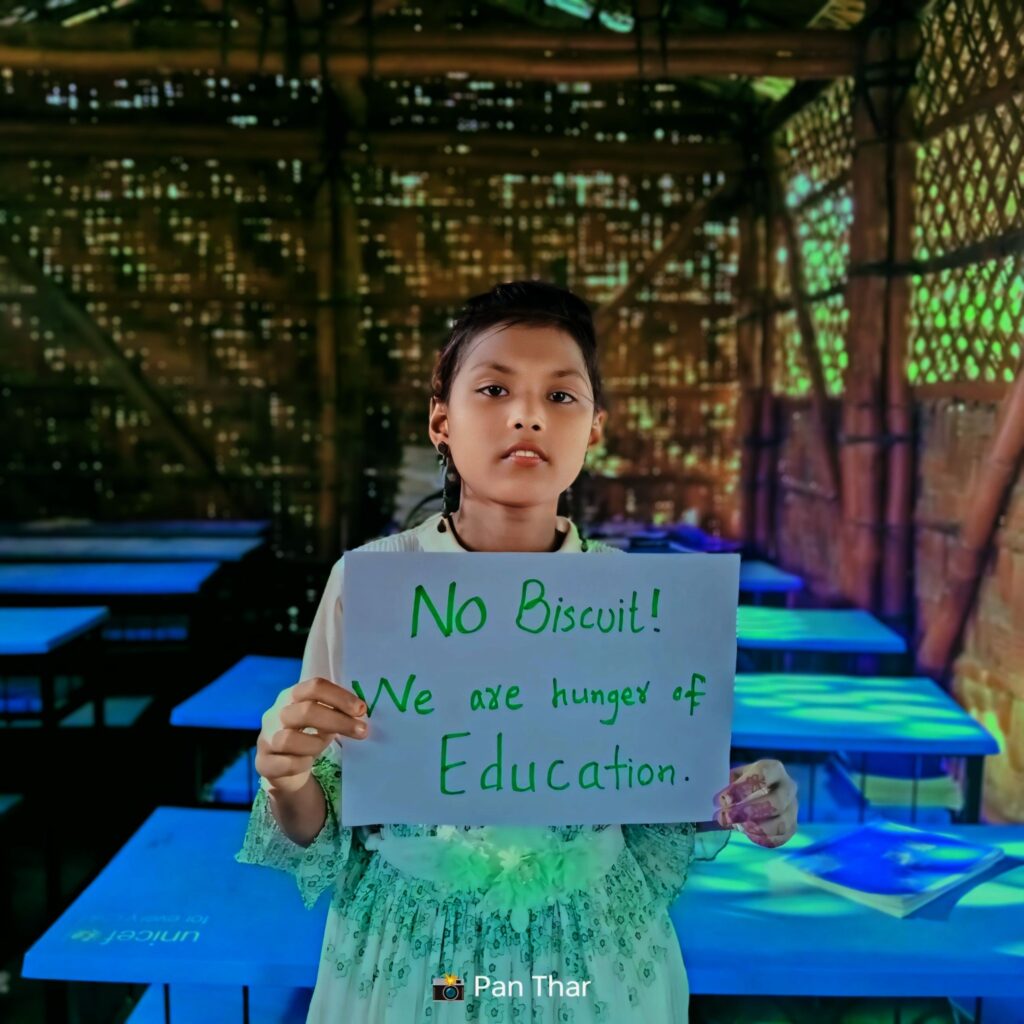 Rohingya Child holding for Education